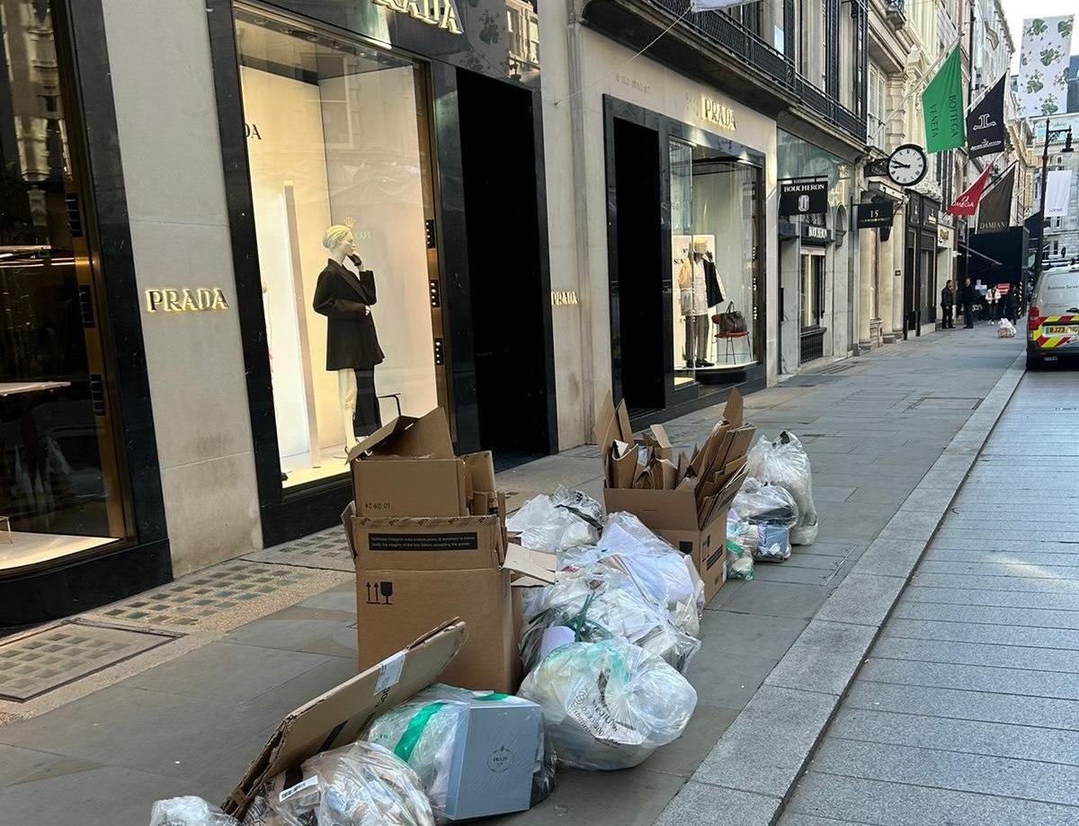 Commercial waste bags ready for kerbside collection on a London street