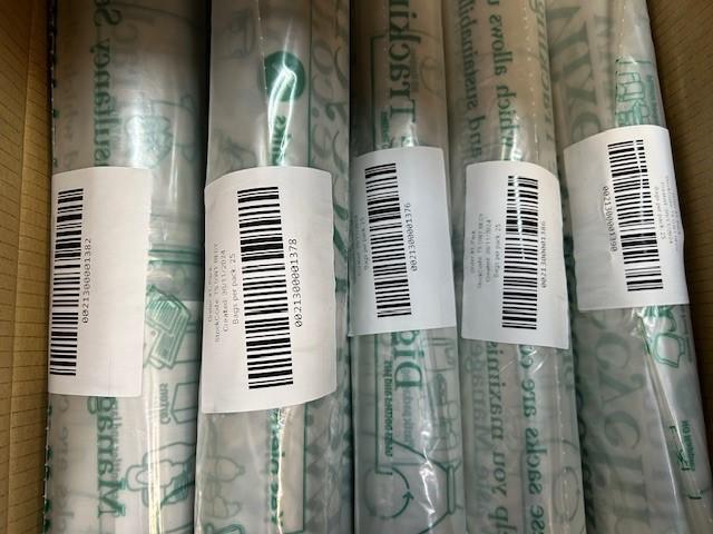 Rolls of barcoded DWT tracked waste sacks